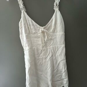 Couple of white and pink dresses along with a shirt!